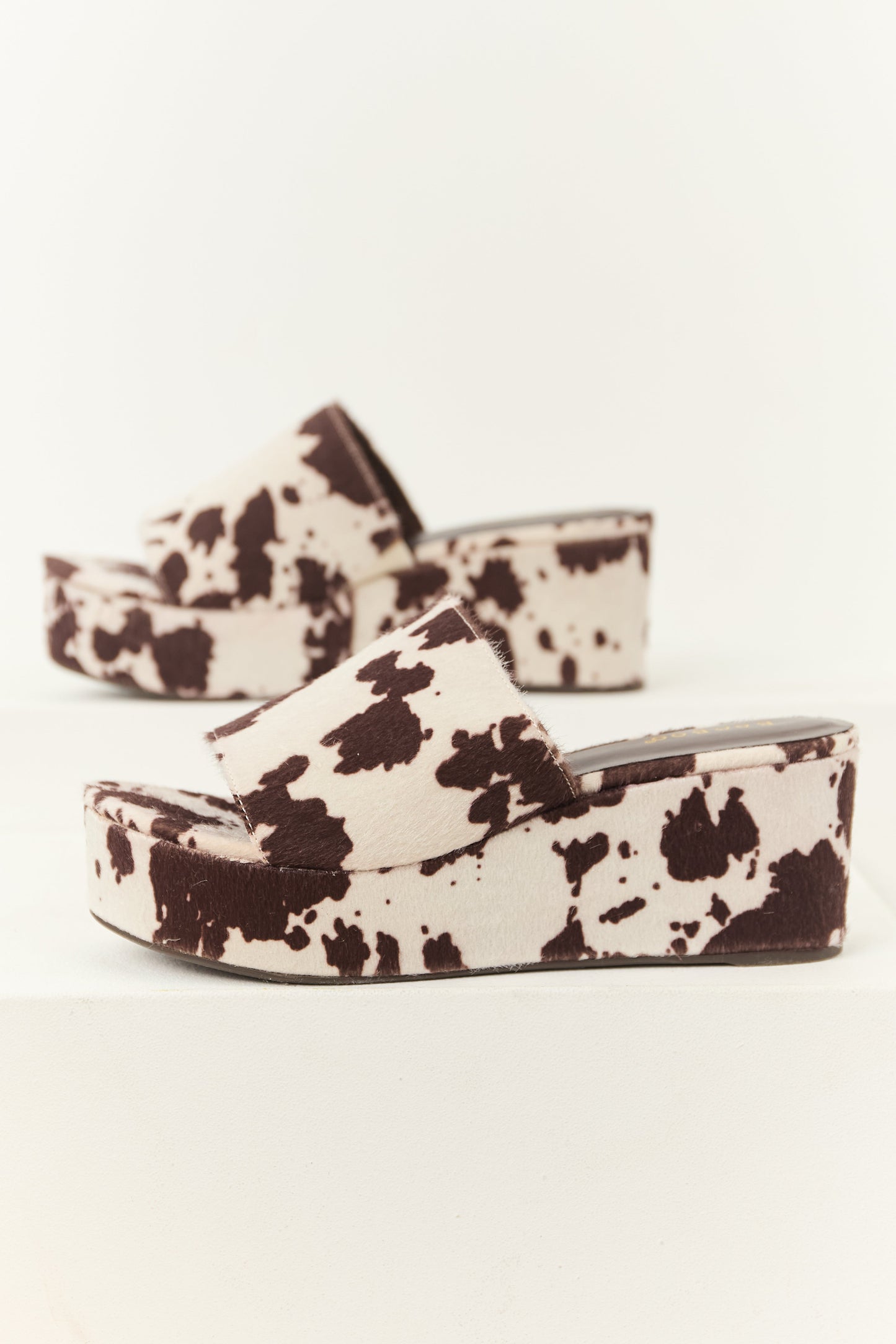 Cocoa Faux Fur Cow Print Slip On Open Toe Wedges